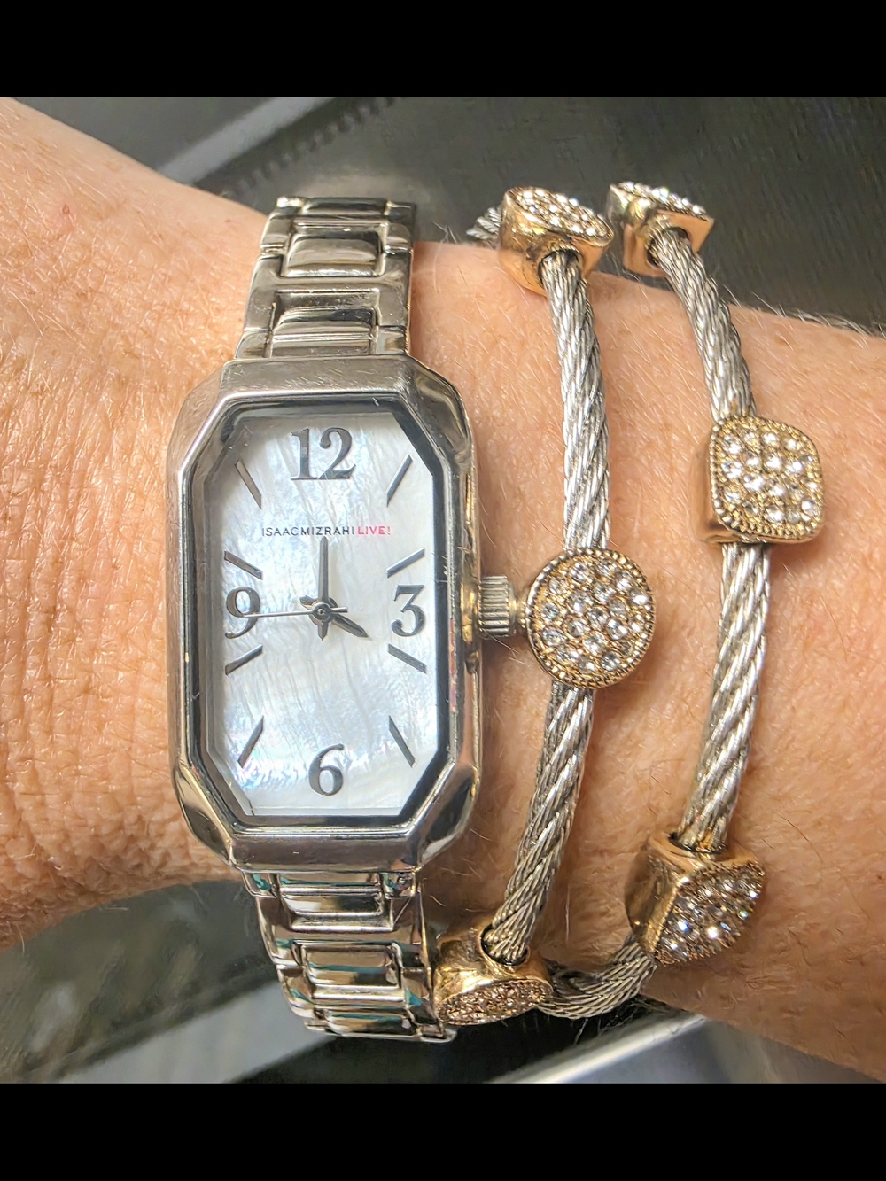 Elegant Silver Rectangular Watch with Mother-of-Pearl Dial